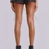 Vaca Whipstitch Faux Leather Mini Shorts in Black