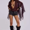 Vaca Whipstitch Faux Leather Mini Shorts in Black